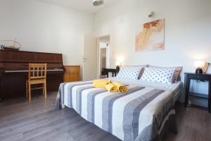 Postel nebo postele na pokoji v ubytování Villa Stina + 17 fotografií
