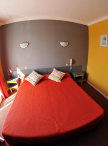 Postel nebo postele na pokoji v ubytování Auberge Béarn Bigorre