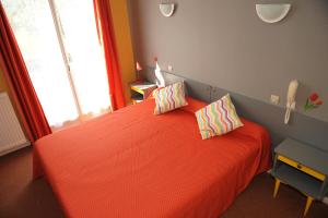 Postel nebo postele na pokoji v ubytování Auberge Béarn Bigorre