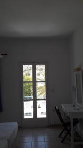 Posteľ alebo postele v izbe v ubytovaní Pavlos Rooms