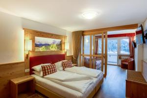TV a/nebo společenská místnost v ubytování Astor Suites B&B