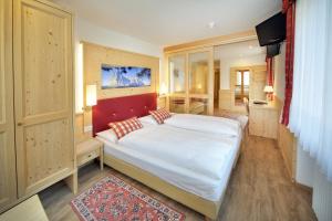 Postel nebo postele na pokoji v ubytování Astor Suites B&B