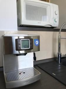Kuchyň nebo kuchyňský kout v ubytování Apartament Aesthetic