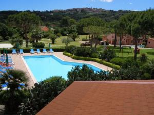 a view of a swimming pool in a resort at Casa Campanella Resort in Capoliveri