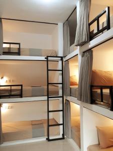 Postel nebo postele na pokoji v ubytování Sammy Homestay