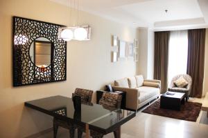 A seating area at The Bellezza Hotel Suites