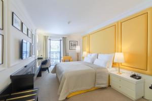 Posteľ alebo postele v izbe v ubytovaní Boutique Hotel Corso