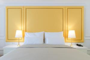 Posteľ alebo postele v izbe v ubytovaní Boutique Hotel Corso