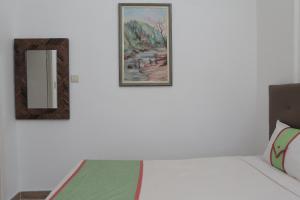 Postel nebo postele na pokoji v ubytování Altamont West Hotel