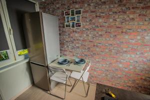 Kuchyňa alebo kuchynka v ubytovaní JDK Apartamenty Podmiejska 38m2 5-osobowy