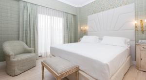 Postel nebo postele na pokoji v ubytování Hotel Praga