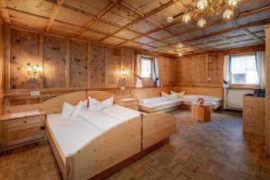 Un pat sau paturi într-o cameră la Anigglhof