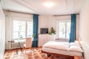 Ένα ή περισσότερα κρεβάτια σε δωμάτιο στο Saint Georges Hotel