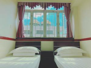 Cama o camas de una habitación en Hang Fung Hostel