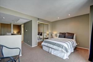 a bedroom with a large bed in a room at Littlefield Lofts #502 in Austin