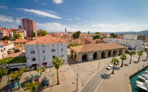 a view of a city with buildings and a street at Apartment Bea with FREE BIKE and BIKE STORAGE in Koper
