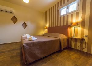 Gallery image of Regina apartments Simotata Sissia in Lourdhata +75 photos