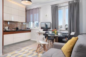 Kuchyňa alebo kuchynka v ubytovaní Apartament ProBaltica II Gdynia