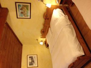 Postel nebo postele na pokoji v ubytování Meuble Villa Neve