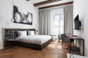 A bed or beds in a room at Hotel Pacai, Vilnius, a Member of Design Hotels