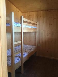 a bunk bed room with two bunk beds in a cabin at Agriturismo Le Rondini Di San Bartolo in San Vincenzo