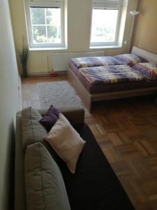 เตียงในห้องที่ Apartmán Hnízdečko Krkonoše