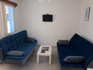 A seating area at Paradise Apart Hotel