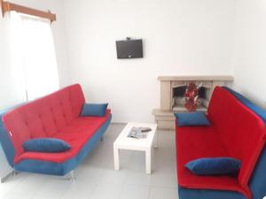 A seating area at Paradise Apart Hotel