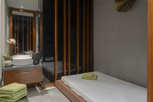 Posteľ alebo postele v izbe v ubytovaní Boutique Hotel Corso