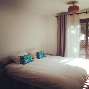 Cama ou camas em um quarto em Eco-Hostal Tambo Verde