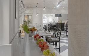 Reštaurácia alebo iné gastronomické zariadenie v ubytovaní Boutique Hotel Corso