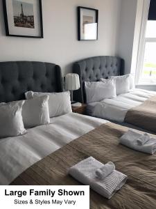 Кровать или кровати в номере Seafront419 By Seafront Collection