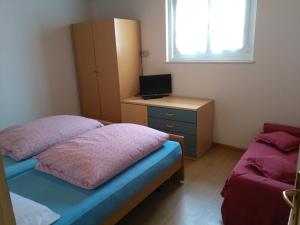 Katil atau katil-katil dalam bilik di Il Giornalgaio