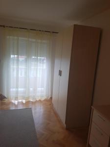 Postel nebo postele na pokoji v ubytování Apartments Jasna