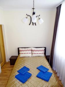 Ένα ή περισσότερα κρεβάτια σε δωμάτιο στο Old City Residence Riharda Vagnera