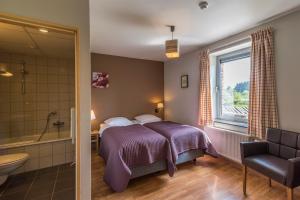 Postel nebo postele na pokoji v ubytování Maison Berton