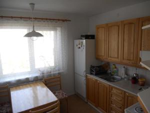 Kuchyň nebo kuchyňský kout v ubytování Kuressaare White Villa