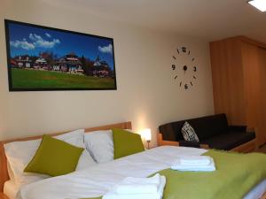 Postel nebo postele na pokoji v ubytování Penzion Adéla