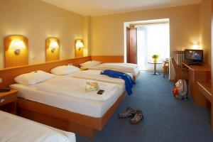 Letto o letti in una camera di Hotel Perekop