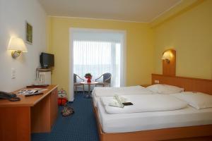 Letto o letti in una camera di Hotel Perekop
