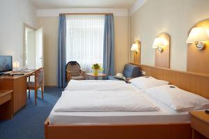 Letto o letti in una camera di Hotel Perekop