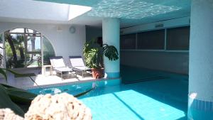 Bazén v ubytování Paradise Relais Villa Janto' nebo v jeho okolí