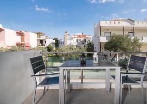 A balcony or terrace at Erifili at Sarti Agora Apartments & Studios