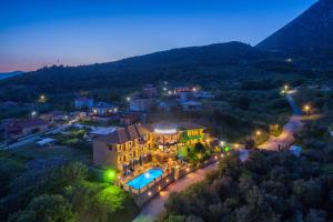 an aerial view of a home at night at Hotel Eirini in Gliki
