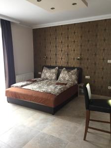 Posteľ alebo postele v izbe v ubytovaní Balaton Kinizsi Apartman