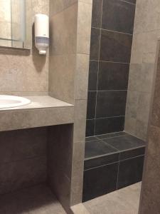 Kúpeľňa v ubytovaní Balaton Kinizsi Apartman