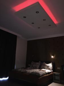 Posteľ alebo postele v izbe v ubytovaní Balaton Kinizsi Apartman