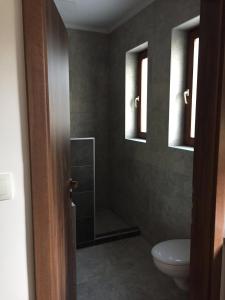Kúpeľňa v ubytovaní Balaton Kinizsi Apartman