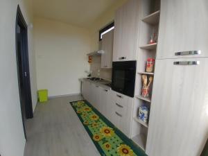 Kuchyňa alebo kuchynka v ubytovaní Sciascia Apartment