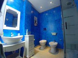 Kúpeľňa v ubytovaní Sciascia Apartment + 18 fotografií